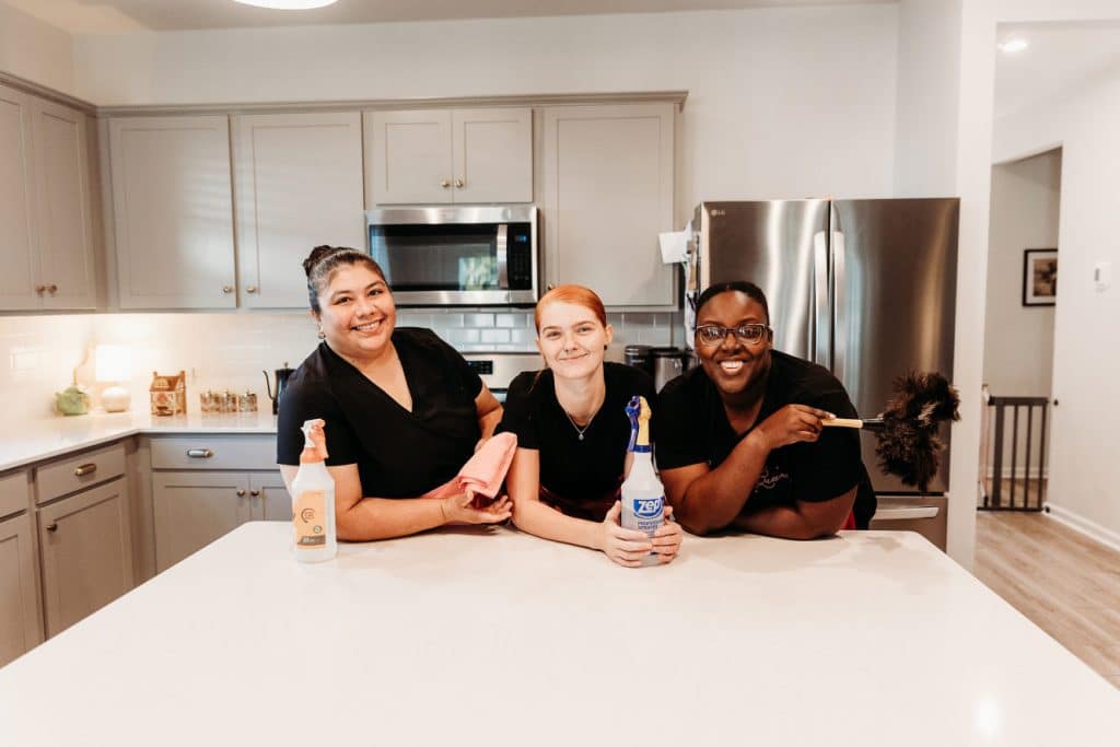 The Sparkling Queens cleaning team in a client kitchen